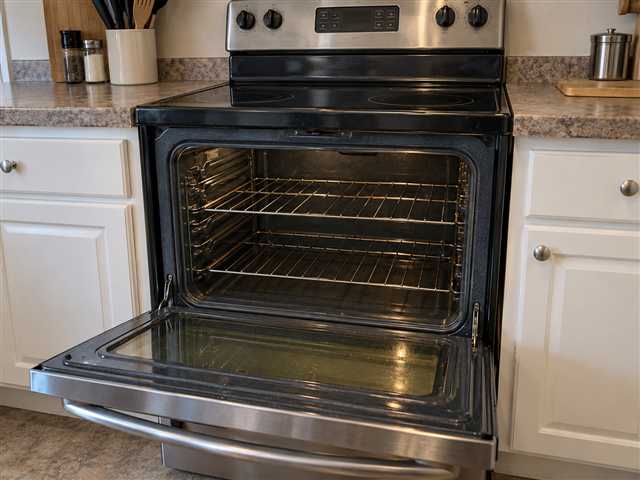 Electric oven with the door open and two racks inside a modest kitchen